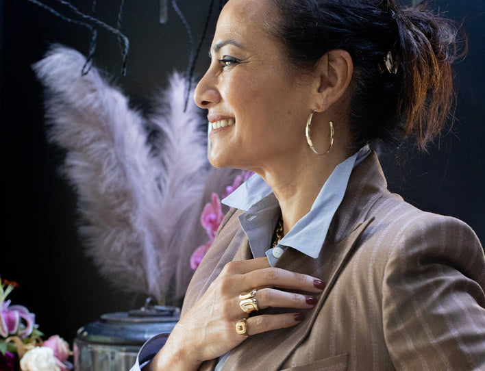 Gina Pell wearing cast jewelry 